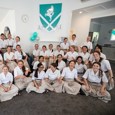 Girl students at King's College celebrate new house opening