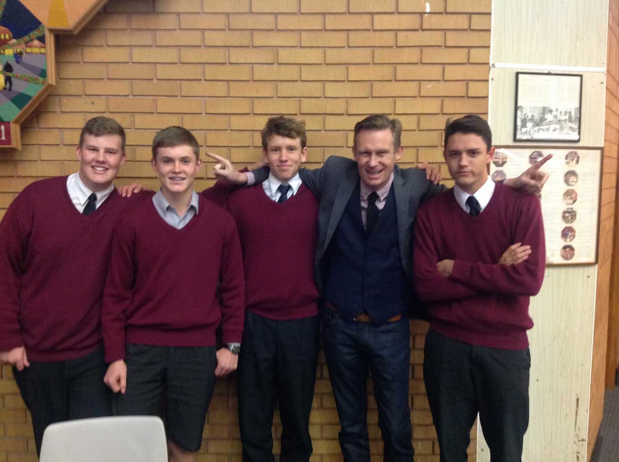 Tim Wilson With School House Students