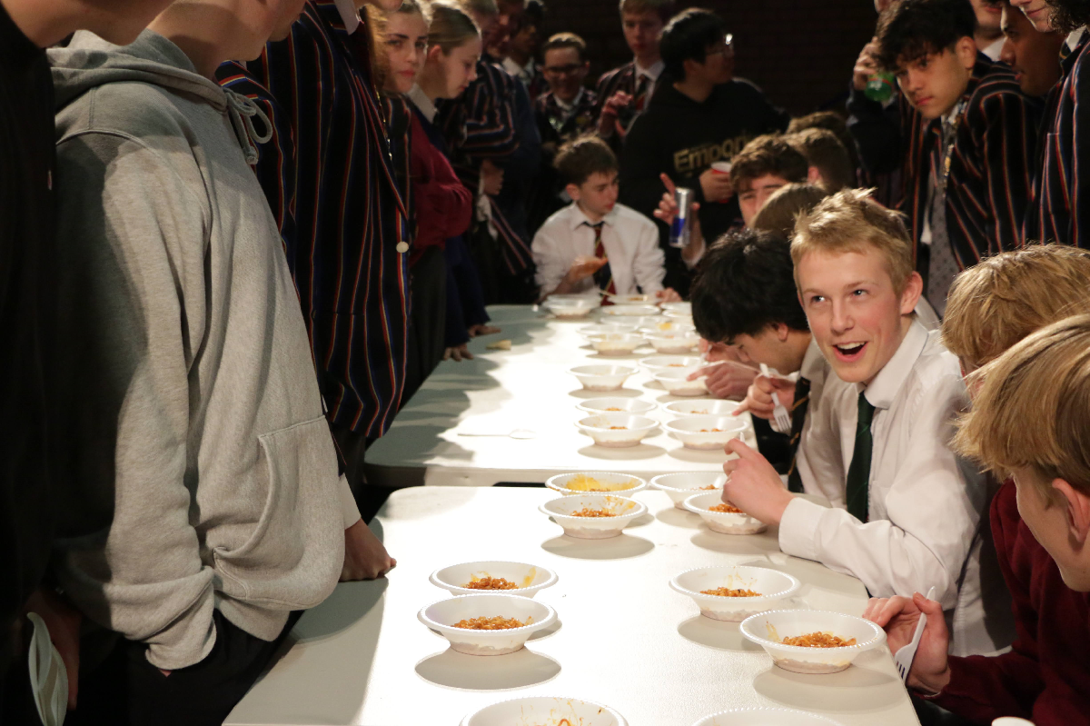 Students At The Annual Kings College International Night Doing The Spicy Noodle Challenge